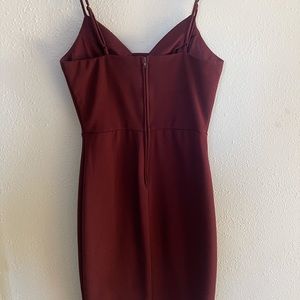 Like new no fade or rips ,Cocktail dress burgundy color , beautiful and fitted